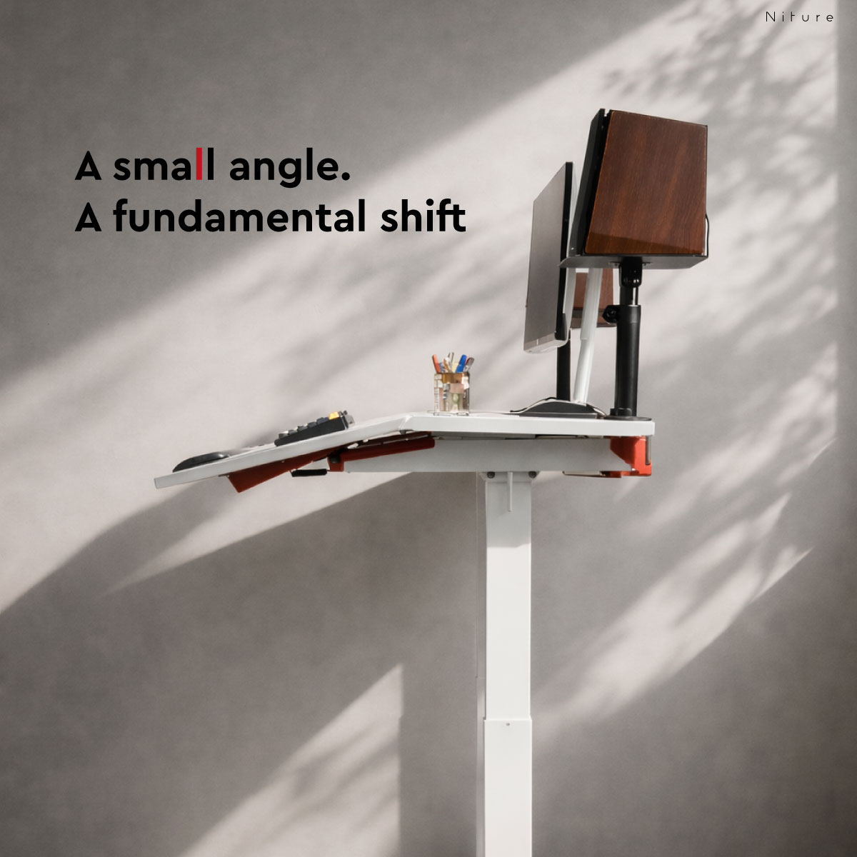 Niture TILT used in an angled sitting position with an ergonomic chair