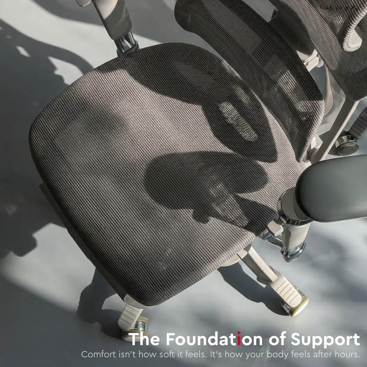 Close-up of the breathable mesh seat on the SINC ergonomic chair